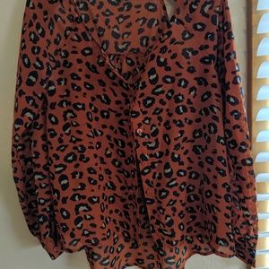 Orange leopard print top